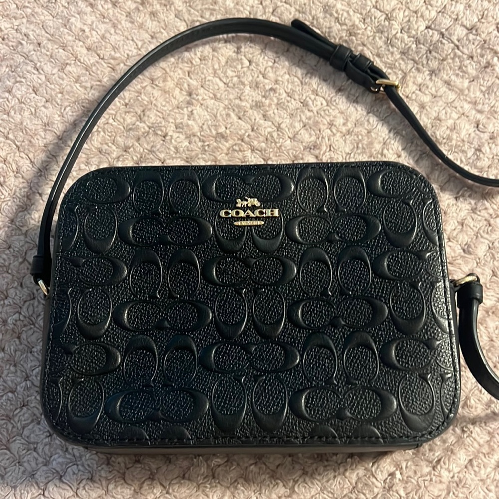 Mini embossed Coach crossbody bag